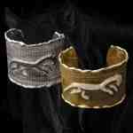 Custom 18kt yellow gold and sterling silver cuffs with pavé-set diamonds. Spirit cuffs | Caribou Collection. FRIDA | Fine Jewellery.