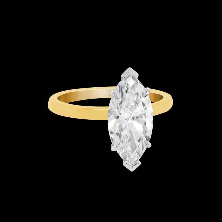 Custom 18kt yellow gold solitaire engagement ring with a marquise diamond | Classic Engagement. FRIDA | Fine Jewellery.
