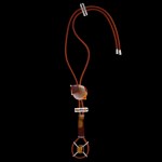 Custom Sunset bolo tie in sterling silver and 18kt yellow gold with agate and gemstones on a linen cord | Caribou Collection. FRIDA | Fine Jewellery.