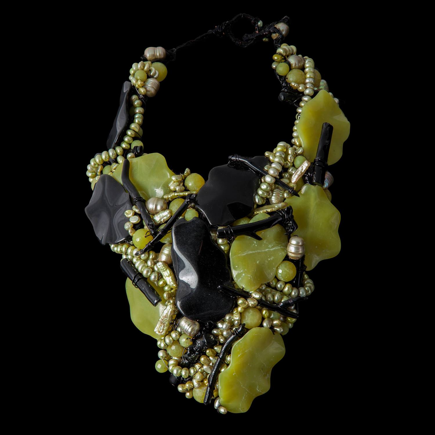 Custom hand-woven neck sculpture with serpentine, black coral, onyx and pearls | Caribou Collection. FRIDA | Fine Jewellery.