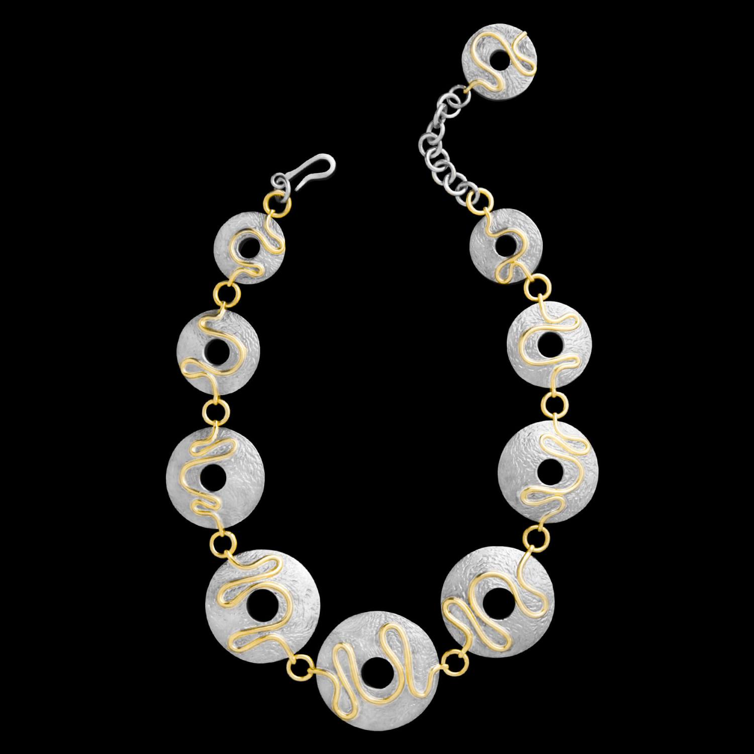 Custom sterling silver and 18kt yellow gold Vortex necklace | Ocean Collection. FRIDA | Fine Jewellery.