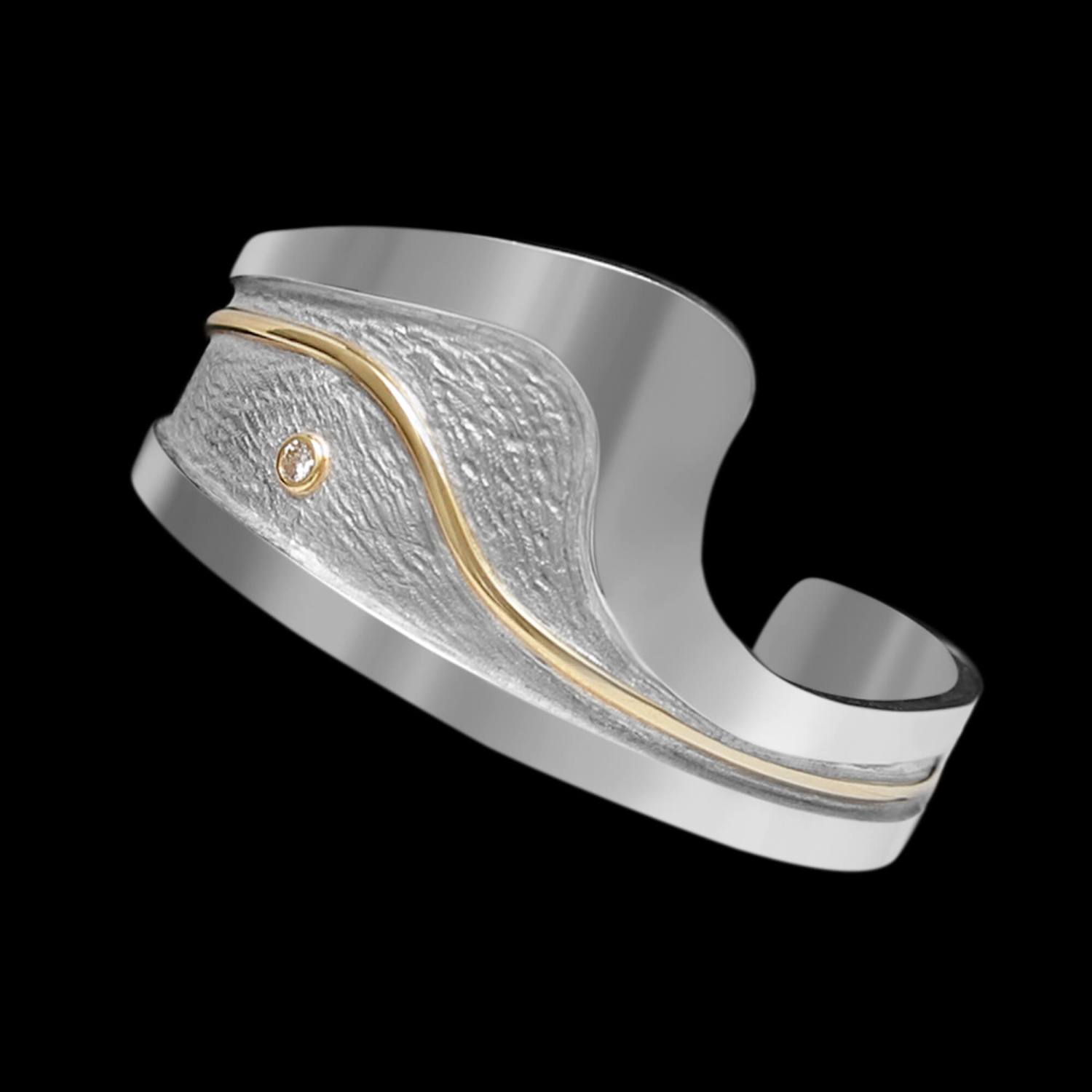 Custom sterling silver and 18kt yellow gold small wave cuff with a brilliant-cut diamond | Ocean Collection. FRIDA | Fine Jewellery.