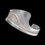 Custom sterling silver and 18kt yellow gold small wave cuff with a brilliant-cut diamond | Ocean Collection. FRIDA | Fine Jewellery.