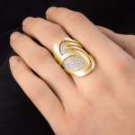 Custom 18kt yellow and white gold Fjord ring with pavé-set diamonds. Perspective | Ocean Collection. FRIDA | Fine Jewellery.