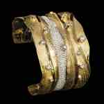 Custom 18kt yellow gold Freya cuff bracelet with a river of pave diamonds | Shield Collection. FRIDA | Fine Jewellery.