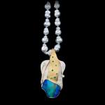 Custom 18kt yellow gold and sterling silver Ingemar pendant with a rare opal, emeralds and diamonds on pearls | Shield Collection. FRIDA | Fine Jewellery.