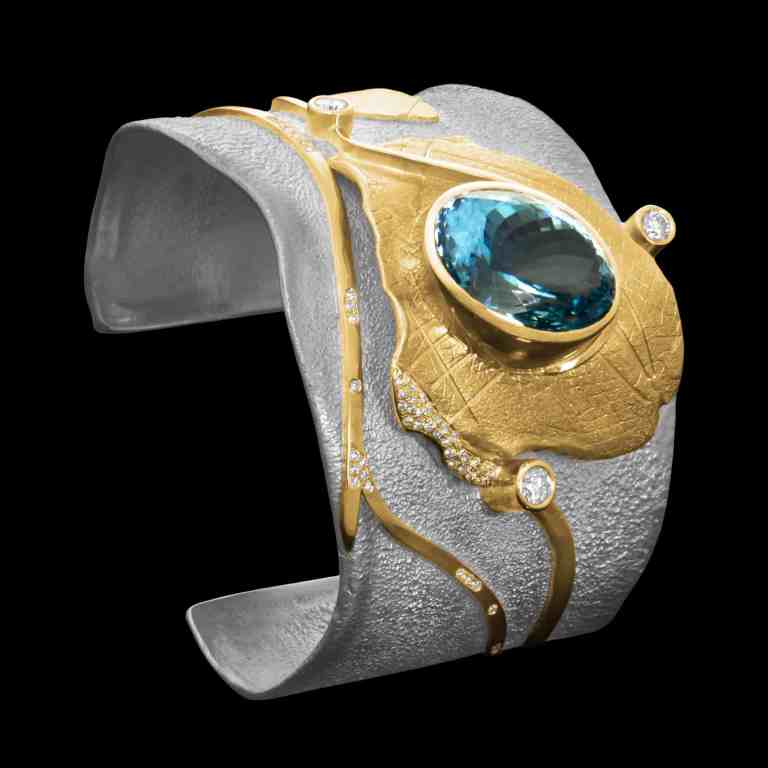 Custom sterling silver and 18kt yellow gold Astrid cuff bracelet with aquamarine and diamonds | Shield Collection. FRIDA | Fine Jewellery.
