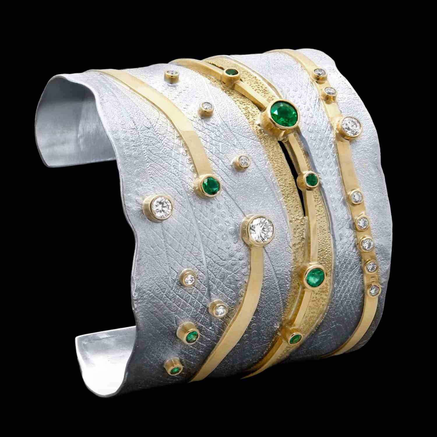 Custom sterling silver and 18kt yellow gold Large River cuff with diamonds and emeralds | Shield Collection. FRIDA | Fine Jewellery.