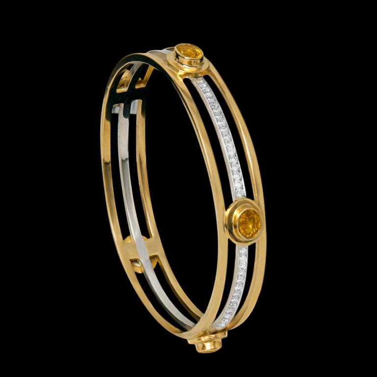 Custom sterling silver and 18kt yellow gold Reign bangle bracelet with yellow sapphires and brilliant-cut diamonds | Shield Collection. FRIDA | Fine Jewellery.