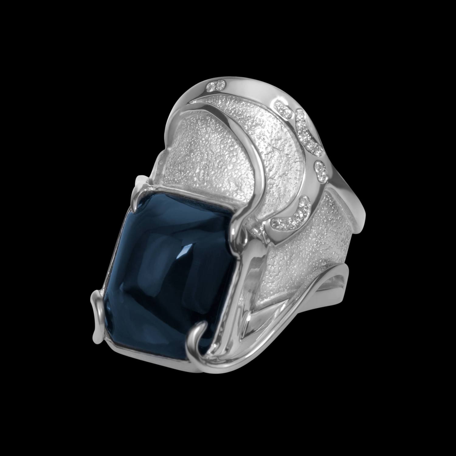 One-of-a-kind sterling silver and 18kt white gold Tempest ring with a cabochon-cut spinel and diamonds | Shield Collection. FRIDA | Fine Jewellery.
