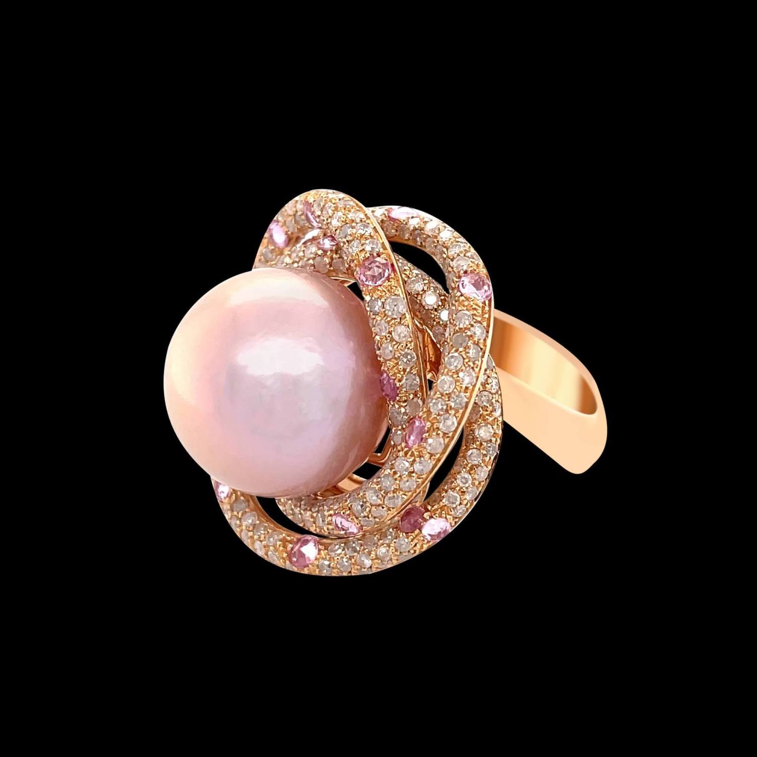 Custom 18kt pink gold statement ring with a pink south sea pearl, white diamonds and pink sapphires. Side. FRIDA | Fine Jewellery.