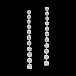 Custom 18kt white gold dangle earrings with 22 graduated floating brilliant-cut diamonds. FRIDA Fine Jewellery.
