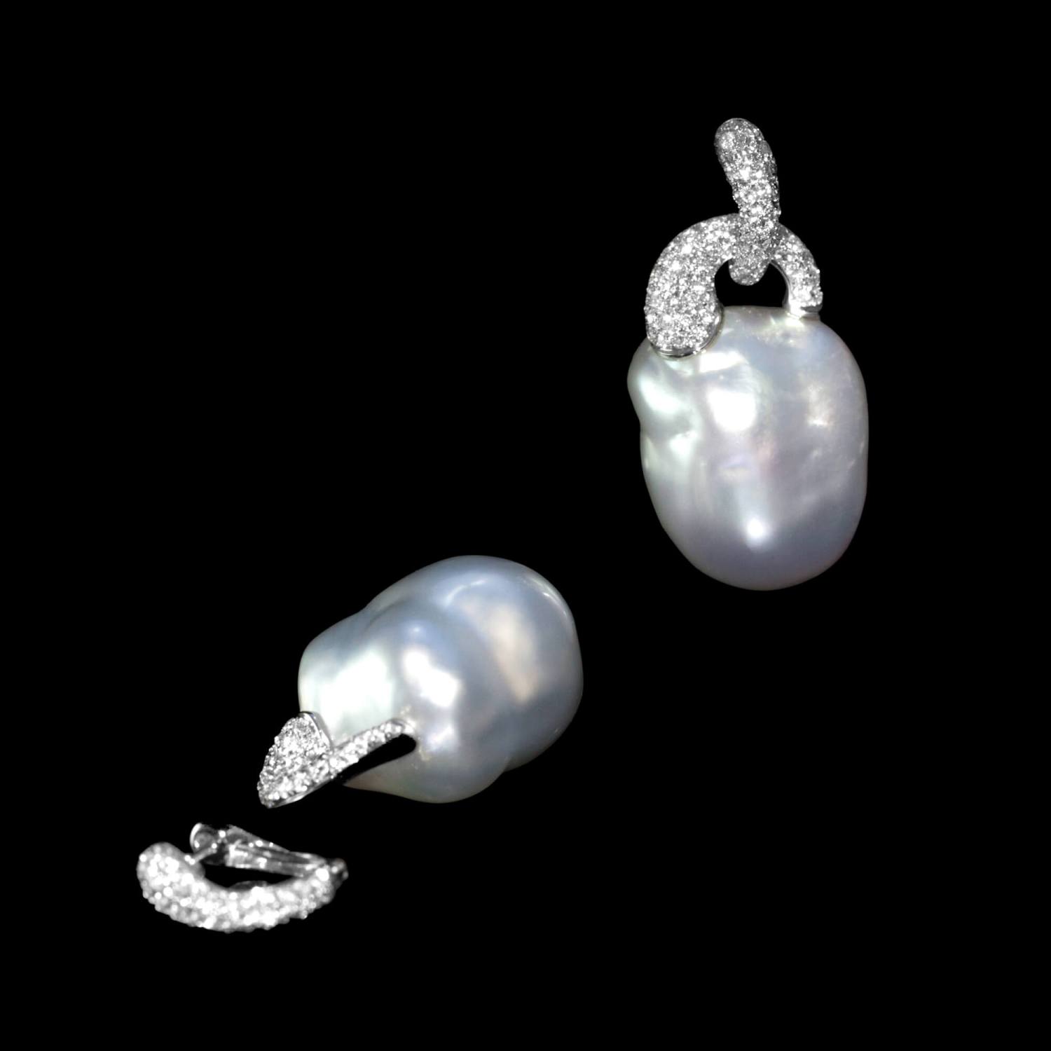 Custom 18kt white gold drop earrings with baroque white South Sea pearls and detachable diamond huggies. FRIDA | Fine Jewellery.