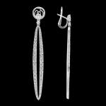 Custom 18kt white gold elongated oval dangle earrings with diamonds. Side. FRIDA | Fine Jewellery.