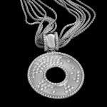 Custom 18kt white gold pendant with scattered white diamonds with a diamond edge | Strata Collection. FRIDA | Fine Jewellery.