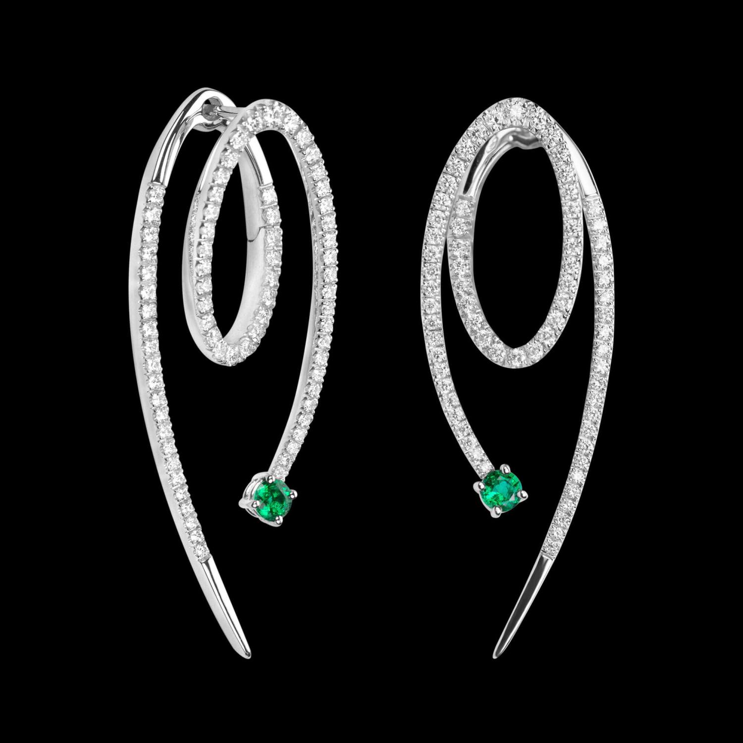 Custom 18kt white gold swirl statement earrings with diamonds and emeralds. FRIDA | Fine Jewellery.
