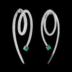 Custom 18kt white gold swirl statement earrings with diamonds and emeralds. FRIDA | Fine Jewellery.