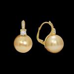 Custom 18kt yellow gold huggie earrings with perfectly matched round golden South Sea pearls and brilliant-cut diamonds. FRIDA | Fine Jewellery.