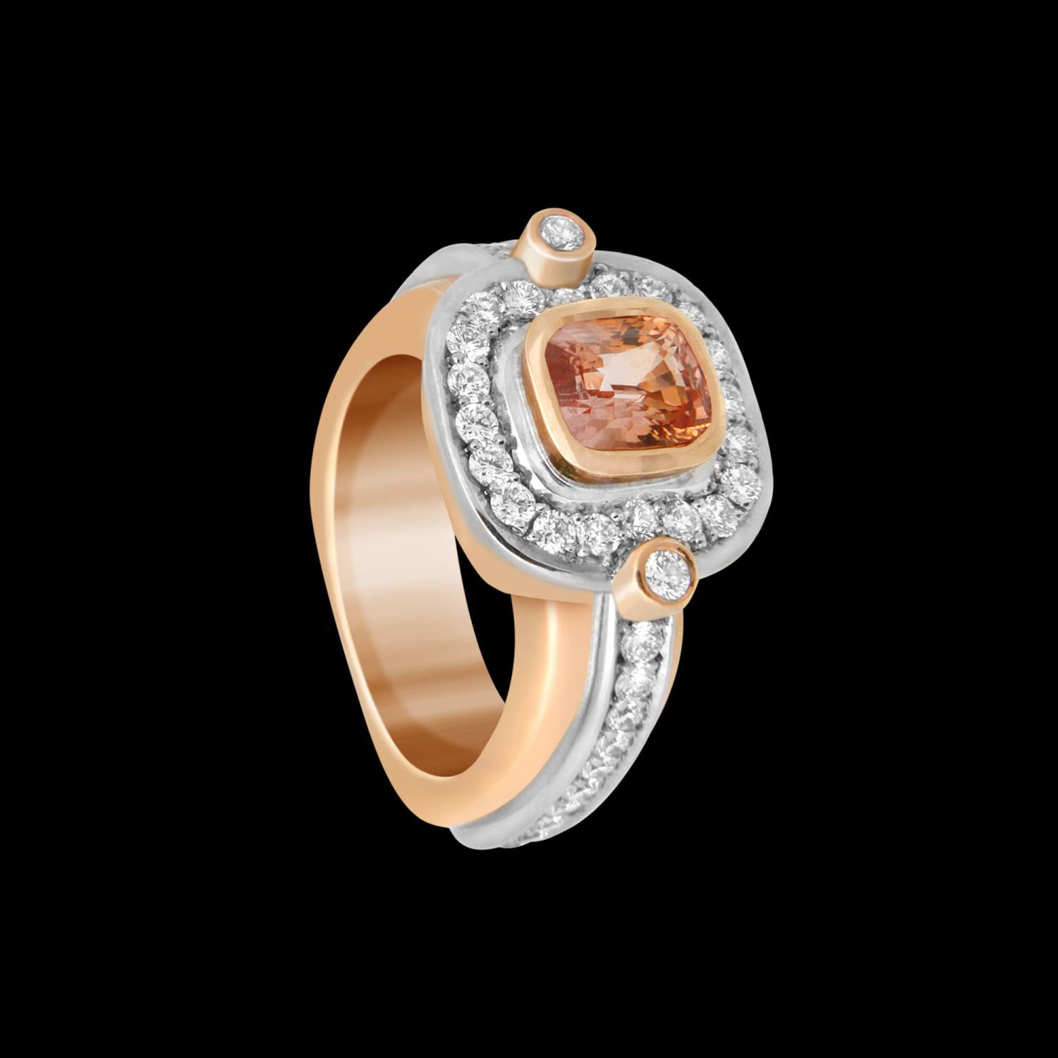 Custom 18kt pink and white gold statement ring with a cushion-cut peach sapphire and diamonds | Signature Engagement. FRIDA | Fine Jewellery.