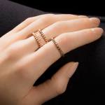 Custom 18kt pink gold Carat Cake stacking ring with diamonds. Perspective. FRIDA | Fine Jewellery.