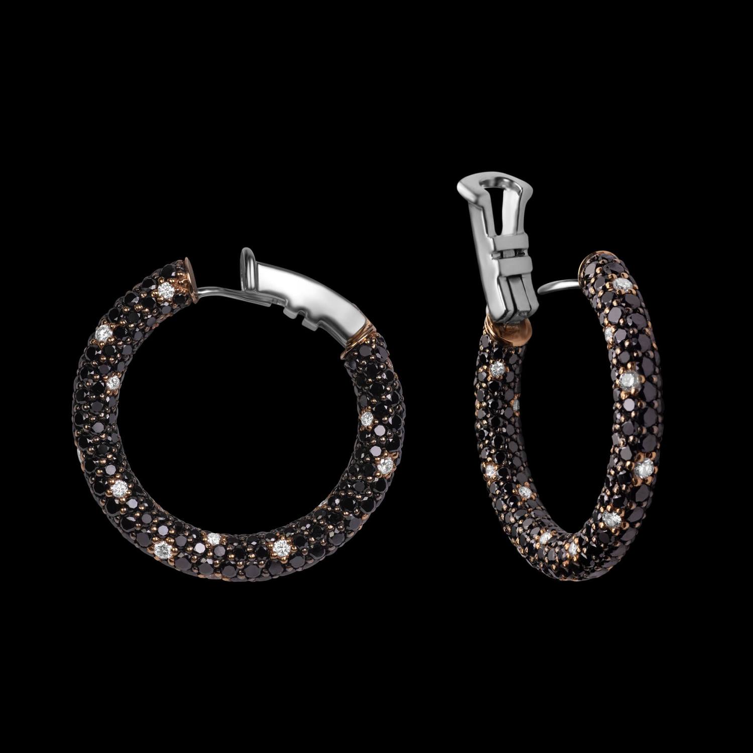 Custom 18kt pink gold and black rhodium hoop earrings with black and white diamonds. FRIDA | Fine Jewellery.