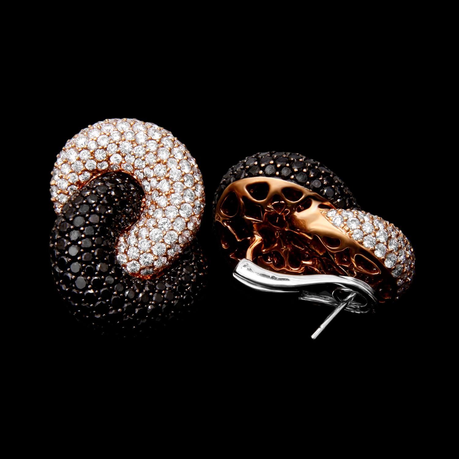 Custom 18kt pink gold knot earrings with black and white diamonds. FRIDA | Fine Jewellery.