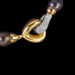 Gold and diamond pearl clasp. FRIDA | Fine Jewellery.