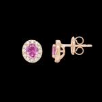 Custom 18kt pink gold stud earrings with pink sapphires and diamond halo. Side. FRIDA | Fine Jewellery.