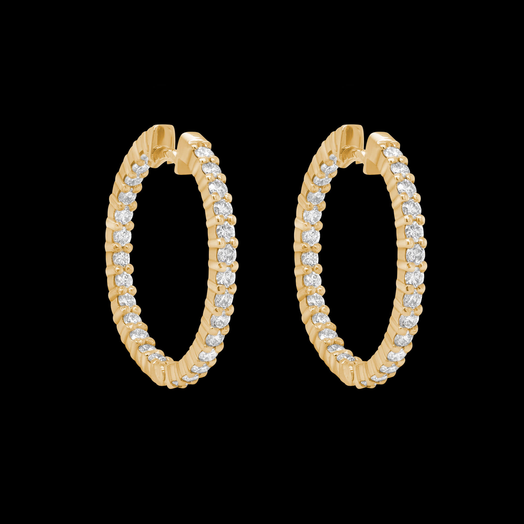 Custom 18kt yellow gold medium round hoops with prong-set diamonds. FRIDA | Fine Jewellery.