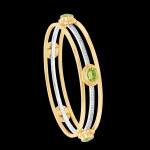Bespoke 18kt yellow and white gold Reign bangle bracelet with chrysoberyls and diamonds | Shield Collection. FRIDA | Fine Jewellery.