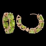 Custom 18kt pink gold hoop earrings with peridot. Side open. FRIDA | Fine Jewellery.