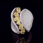Custom couture 18kt white and yellow gold statement ring with fancy yellow diamonds and brilliant-cut white diamonds. Video. FRIDA | Fine Jewellery.