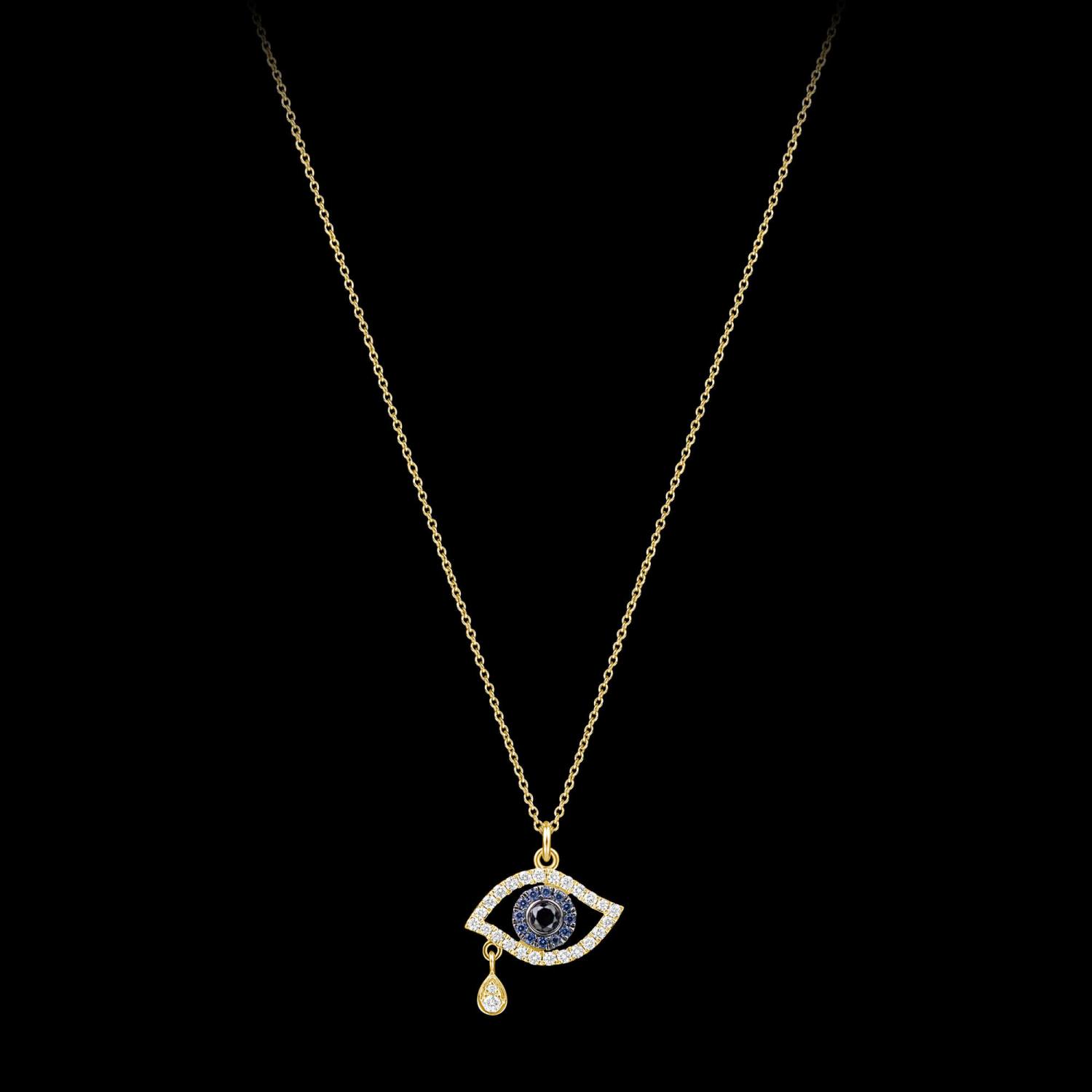 Custom 18kt yellow gold evil eye necklace set with diamonds and blue sapphires. FRIDA | Fine Jewellery.