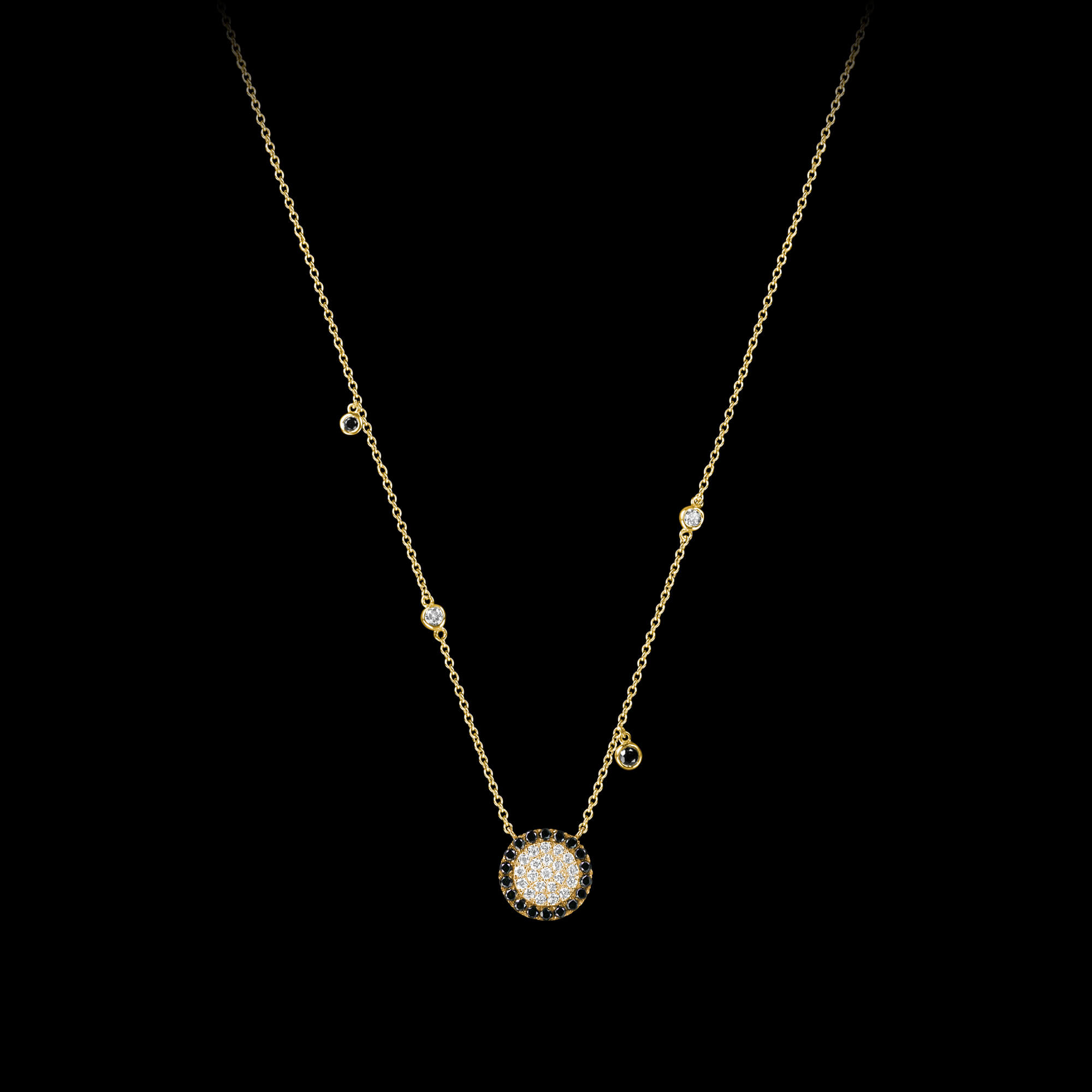 Custom 18kt yellow gold floating disk necklace with white and black diamonds. FRIDA | Fine Jewellery.