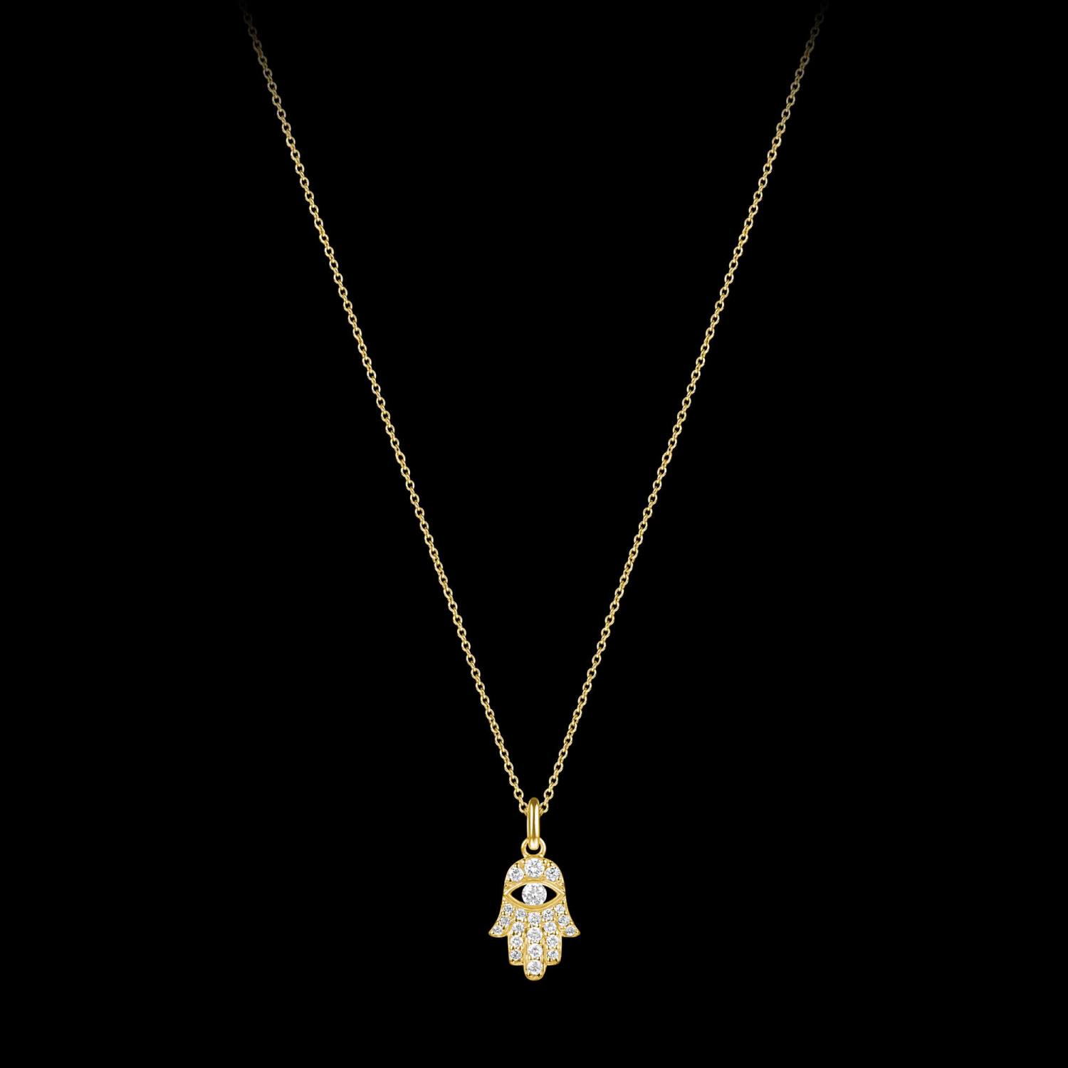 Custom 18kt yellow gold hamsa hand with diamonds. FRIDA | Fine Jewellery.