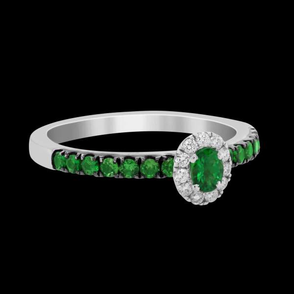 Custom 18kt white and black rhodium ring with tsavorite and a diamond halo. FRIDA | Fine Jewellery.