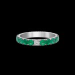 Custom 18kt white gold band ring with diamonds and emeralds set in black rhodium. Front. FRIDA Fine Jewellery.