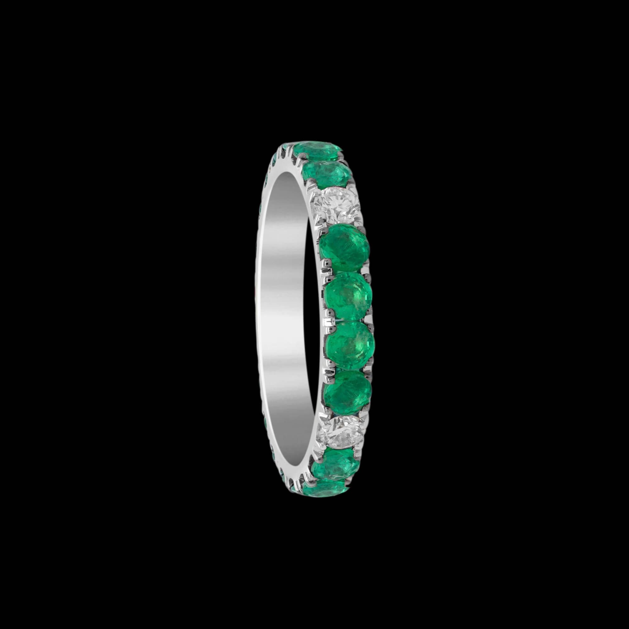 Custom 18kt white gold band with diamonds and emeralds set in black rhodium. FRIDA Fine Jewellery.