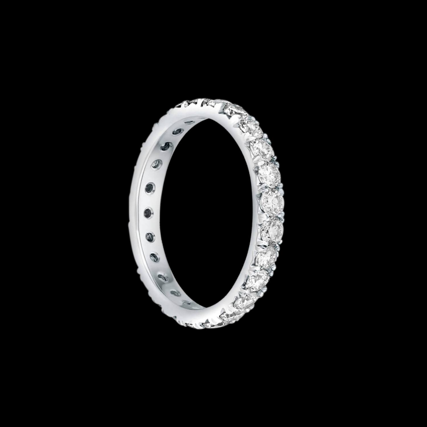 Custom 18kt white gold eternity brand with prong-set diamonds. FRIDA | Fine Jewellery.