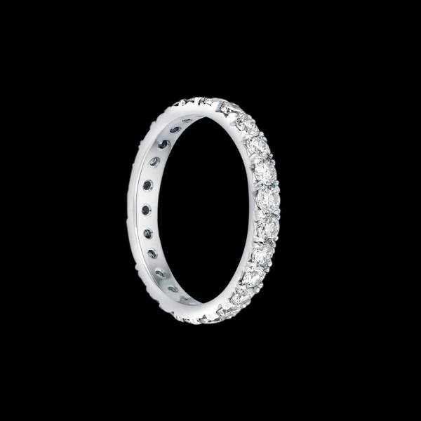 Custom 18kt white gold eternity brand with prong-set diamonds. FRIDA | Fine Jewellery.
