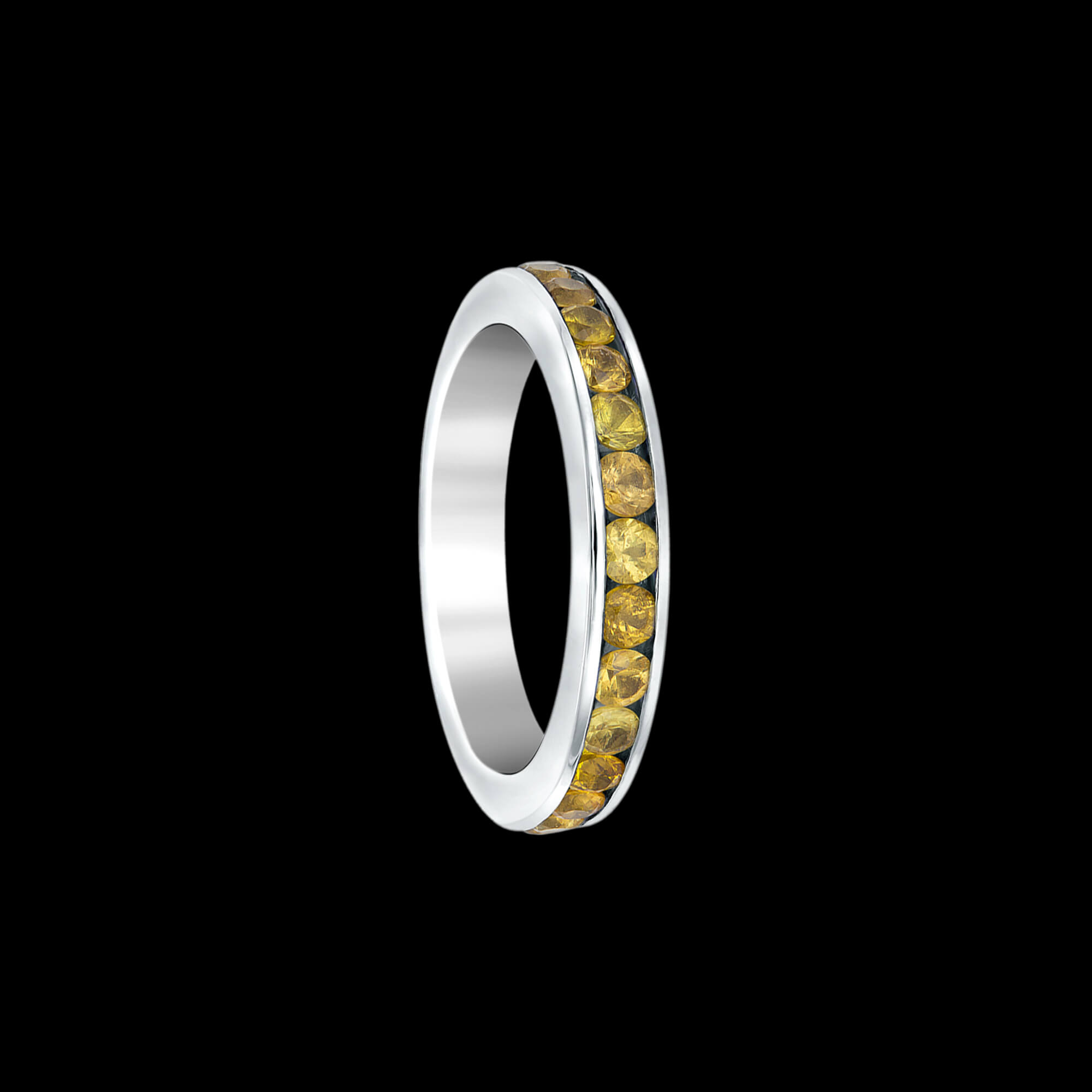 Custom 18kt white gold eternity wedding band ring with yellow sapphires. FRIDA | Fine Jewellery.