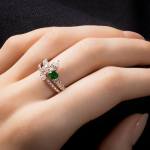 Custom 18kt white gold stacking rings with emeralds and diamonds. FRIDA | Fine Jewellery