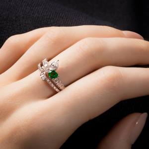 Custom 18kt white gold stacking rings with emeralds and diamonds. FRIDA | Fine Jewellery