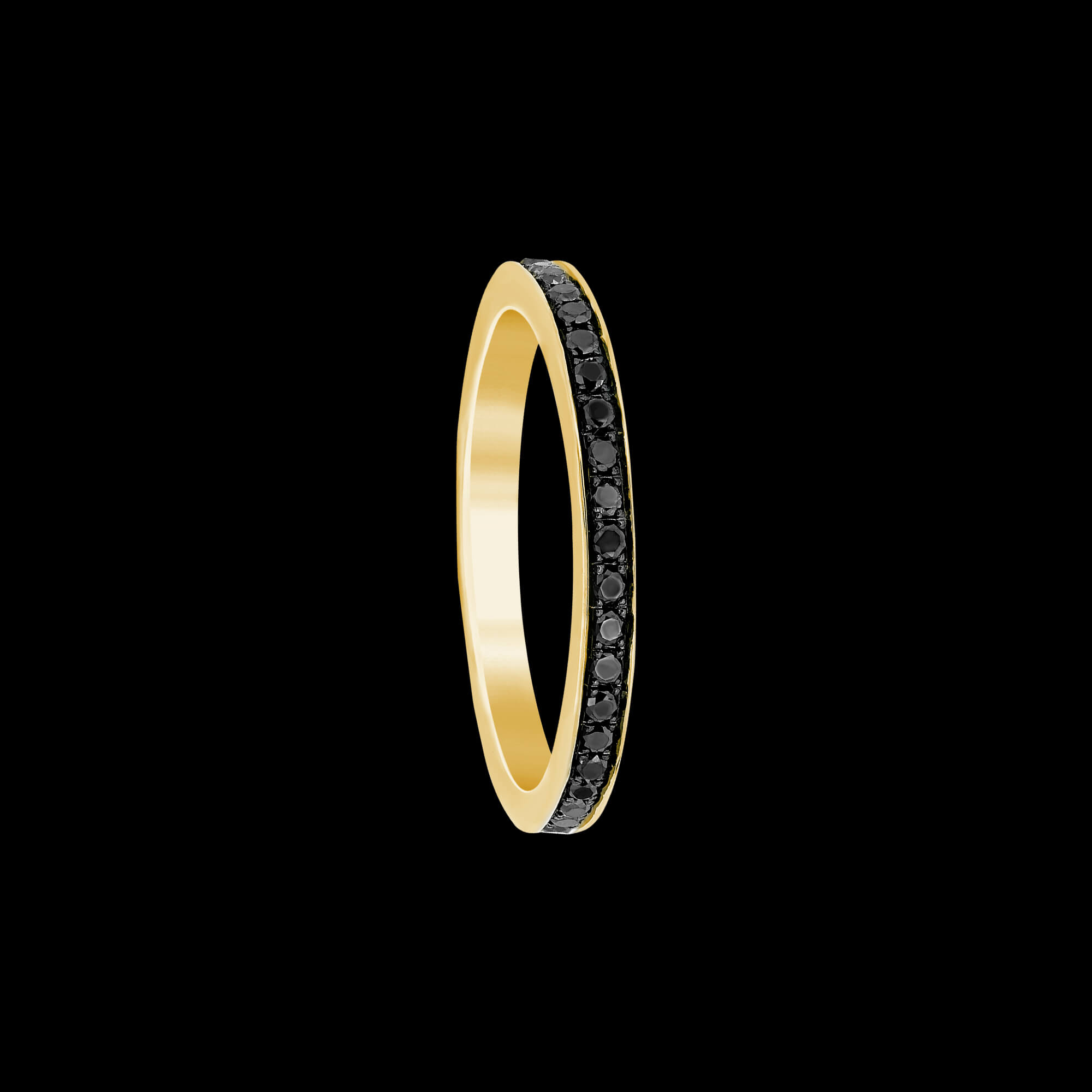Custom 18kt yellow gold eternity band ring with black diamonds. FRIDA | Fine Jewellery.