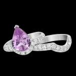 Custom engagement ring in 18kt white gold with a natural pear pink-lavender sapphire and diamonds with interlocking band | Signature Engagement. FRIDA | Fine Jewellery.