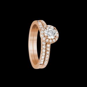Custom 18kt pink gold halo engagement ring with a round diamond and diamond shank with matching wedding band | Classic. FRIDA | Fine Jewellery.