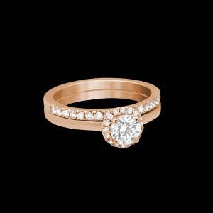 Custom 18kt pink gold halo engagement ring with a round diamond with matching wedding band | Classic. FRIDA | Fine Jewellery.