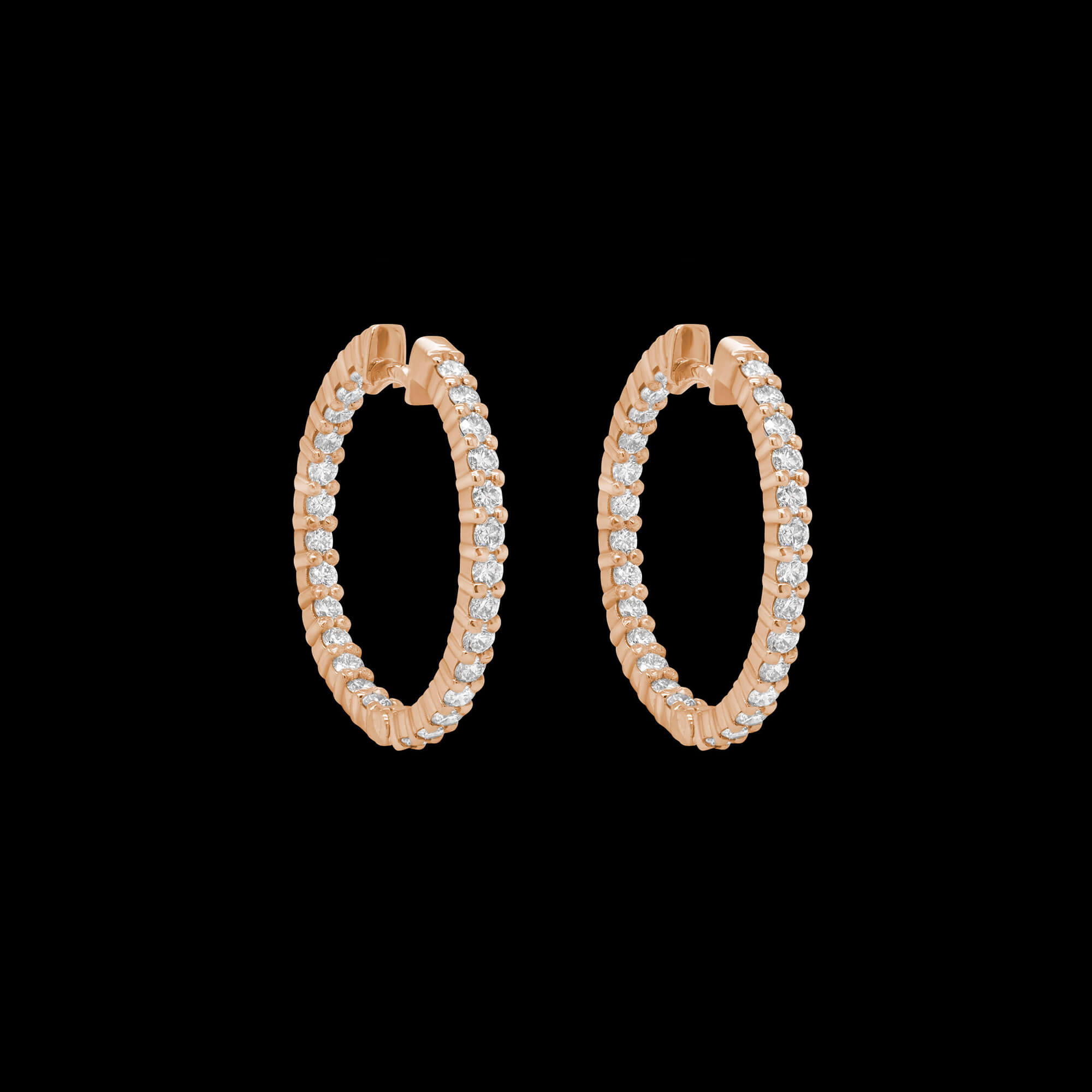Custom 18kt pink gold small round hoops with prong-set diamonds. FRIDA | Fine Jewellery.