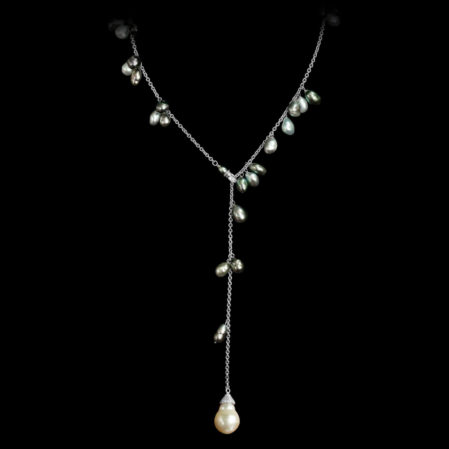 Custom 18kt white gold adjustable link-chain lariat necklace with Keshi pearls, a baroque South Sea pearl drop and diamonds. FRIDA | Fine Jewellery.