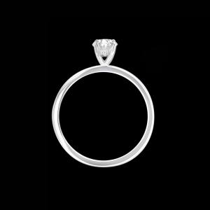 Custom 18kt white gold engagement ring with an oval centre diamond and pave-set diamond hidden halo. Profile | Classic. FRIDA | Fine Jewellery.